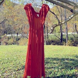 Beautiful Long and flowy orange H&M dress size 6 with two slits up the front.